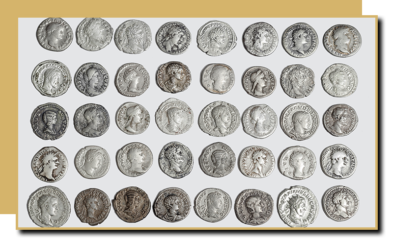 A set of coins on display against a white backdrop